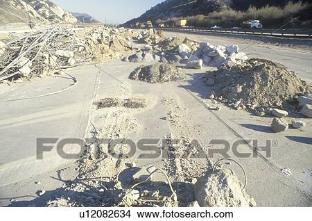 The remnants of a freeway collapse after earthquake View Large Photo Image Picture - The remnants of a freeway collapse after earthquake. Fotosearch
