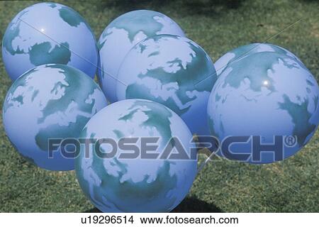 Picture - A group of balloons designed to look like globes. Fotosearch