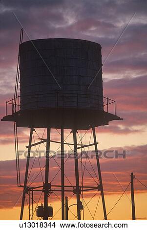 A water tank at sunset View Large Photo Image Picture - A water tank at sunset. Fotosearch