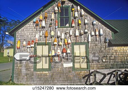 Lobster buoys on side of building in Muscongus Bay in New Harbor ME View Large Photo Image Stock Image - Lobster buoys on side of building in Muscongus Bay in New Harbor ME. Fotosearch