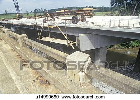 Stock Image - Rebuilding roads and bridges. Fotosearch