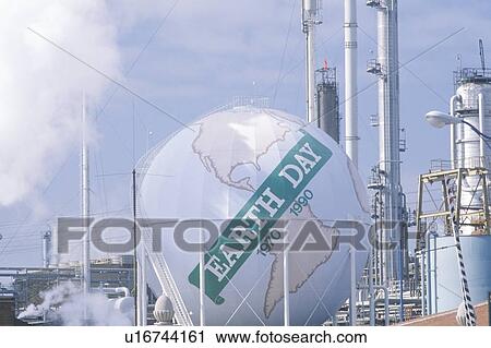 Tank painted as a globe with the words “Earth Day 1970-1990” at an oil refinery in USA View Large Photo Image Stock Image - Tank painted as a globe with the words “Earth Day 1970-1990” at an oil refinery in USA. Fotosearch
