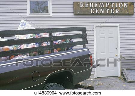 The back of a brown truck pulling up to a recycling redemption center View Large Photo Image Picture - The back of a brown truck pulling up to a recycling redemption center. Fotosearch