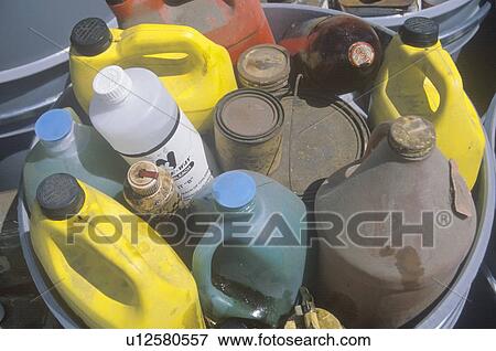 Stock Photo - Toxic waste containers awaiting proper disposal. Fotosearch