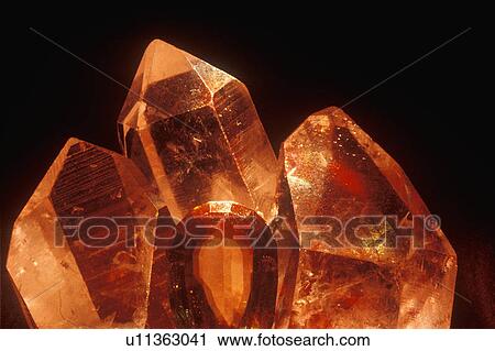 A close-up of jewels and glowing crystal rock formations View Large Photo Image Stock Image - A close-up of jewels and glowing crystal rock formations. Fotosearch