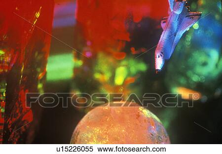 A glowing crystal sphere and spaceship against a multi-colored variegated background sky View Large Photo Image Stock Photography - A glowing crystal sphere and spaceship against a multi-colored variegated background sky. Fotosearch