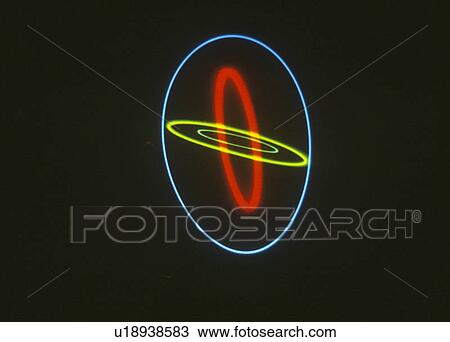 Stock Image - A glowing pattern of laser lights against a black background. Fotosearch