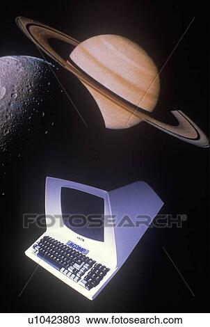 Stock Image - Space special effects composite of computer, moon and Saturn. Fotosearch