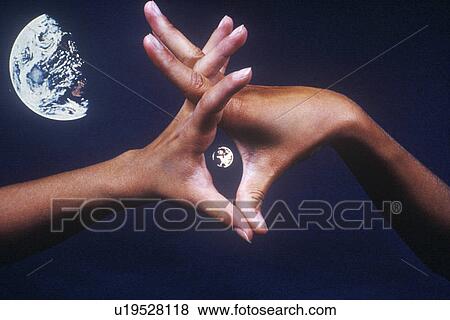 Special effects composite of interlaced hands and Earth in black sky View Large Photo Image Stock Photo - Special effects composite of interlaced hands and Earth in black sky. Fotosearch