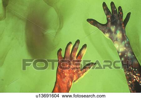Special effects composite of posterized silhouette of two hands View Large Photo Image Picture - Special effects composite of posterized silhouette of two hands . Fotosearch