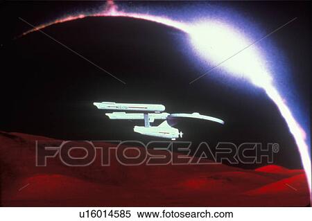 Star Trek's USS Enterprise soars over and alien landscape View Large Photo Image Stock Photography - Star Trek's USS Enterprise soars over and alien landscape. Fotosearch