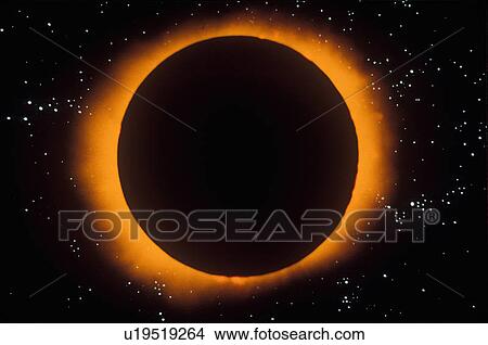 Picture - A black glowing sun with an orange corona against a starry background. Fotosearch
