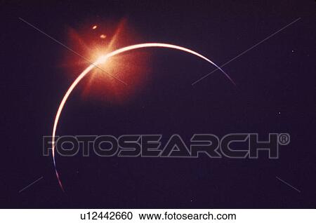 A total solar eclipse with the diamond ring effect View Large Photo Image Stock Image - A total solar eclipse with the diamond ring effect. Fotosearch