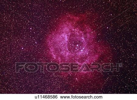 Stock Photograph - Rosette Nebula in the constellation Monoceros. Fotosearch