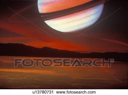 Stock Image - Saturn superimposed on a cloudy sunset sky. Fotosearch