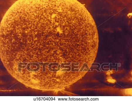 Picture - The Sun as viewed through a filter revealing surface features. Fotosearch
