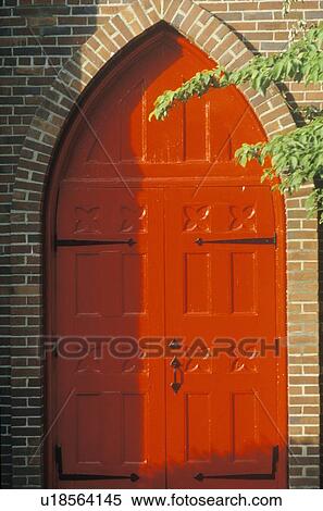 Stock Photography - Behind the Red Door Church. Fotosearch