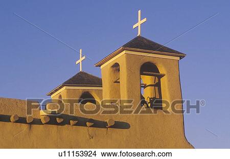Picture - Mission or pueblo at sunset. Fotosearch