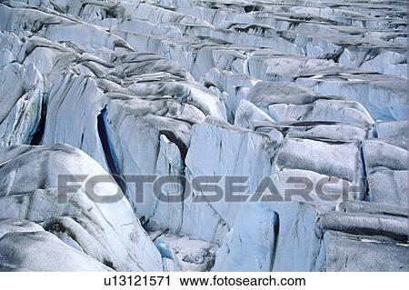 Stock Image - Aerial view of glacier in St. Elias National Park. Fotosearch