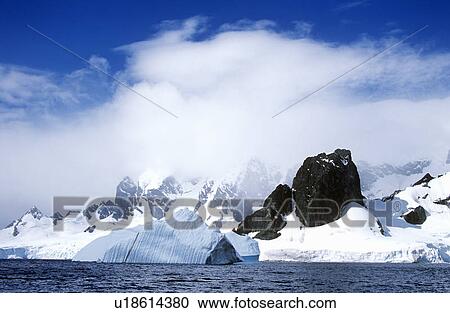 Stock Image - Glaciers and icebergs in Errera Channel at Culberville Island. Fotosearch