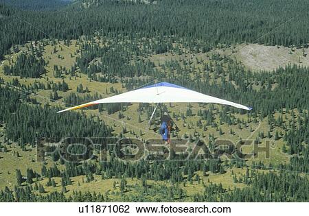 Stock Image - Aerial view of Hang Glider. Fotosearch