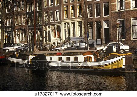 Stock Photo - Canal and houseboat. Fotosearch