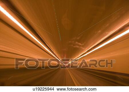 Streaked lights in tunnel View Large Photo Image Picture - Streaked lights in tunnel. Fotosearch