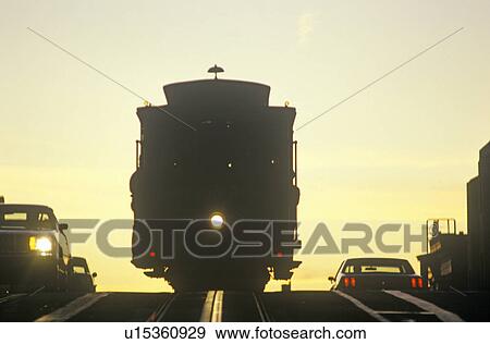 Stock Photo - Sunset on cable car. Fotosearch