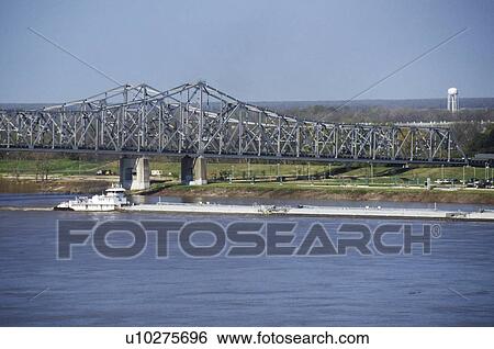 Stock Photograph - A barge in the Mississippi River. Fotosearch