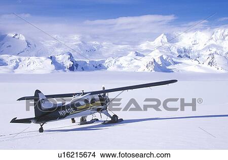 Airplane parked on glacier View Large Photo Image Picture - Airplane parked on glacier. Fotosearch