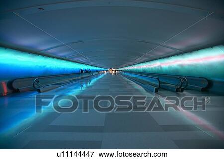 Moving sidewalks and a changing light show View Large Photo Image Stock Photo - Moving sidewalks and a changing light show. Fotosearch