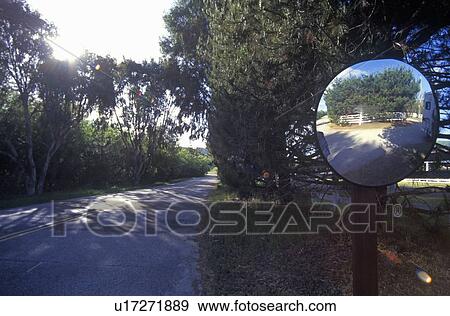 Stock Photo - A road and a fish eye mirror. Fotosearch