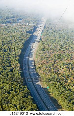 Fog along an interstate highway in Maine View Large Photo Image Stock Image - Fog along an interstate highway in Maine. Fotosearch