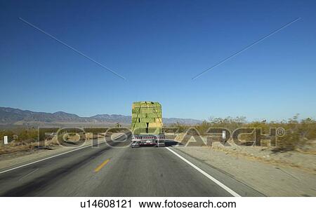 Hay truck on highway View Large Photo Image Stock Image - Hay truck on highway. Fotosearch