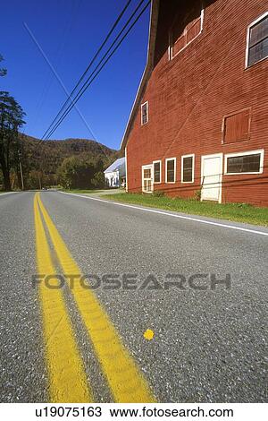 Red barn by side of road View Large Photo Image Stock Image - Red barn by side of road. Fotosearch