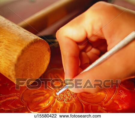 Stock Image - hand, pen, wood, graver, stationary. Fotosearch