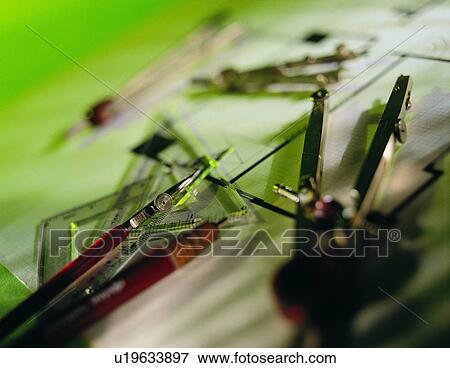 Stock Photo - pen, compasses, stationary, dividers, triangle. Fotosearch