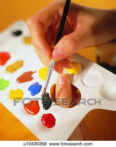 Stock Photo - stationary, hand, brush, palette, pen. Fotosearch