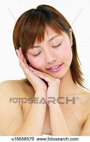 Stock Photo - Bangs, Close-Up, Brown Hair, Asian Ethnicity. Fotosearch