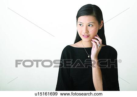 Stock Photo - Waist-Up, Beauty, Black Hair, One Person, Long Hair. Fotosearch