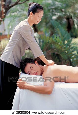 Picture - applying, asian ethnicity, adoring. Fotosearch