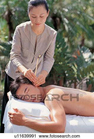 Stock Image - applying, asian ethnicity, adoring. Fotosearch