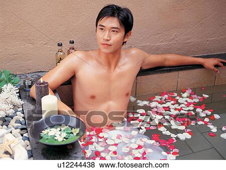 Stock Photo - bare chest, bathtub, beautification. Fotosearch