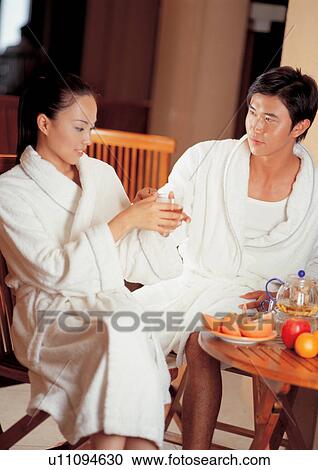 bathrobe, happy, grinning, leisure, holding, chair, young man View Large Photo Image Stock Image - bathrobe, happy, grinning, leisure, holding, chair, young man. Fotosearch