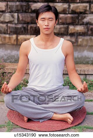 Man meditating View Large Photo Image Stock Image - Man meditating . Fotosearch