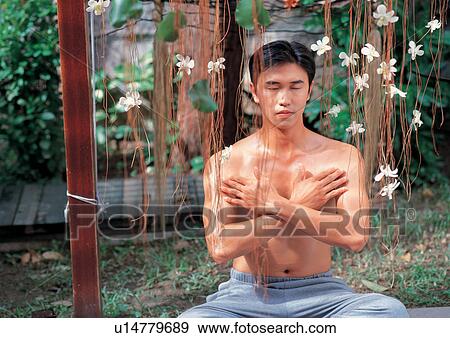 Man meditating View Large Photo Image Stock Photo - Man meditating . Fotosearch