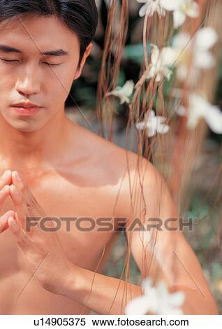 Man meditating View Large Photo Image Stock Photography - Man meditating. Fotosearch