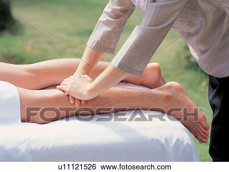 Person getting a massage View Large Photo Image Stock Photograph - Person getting a massage . Fotosearch