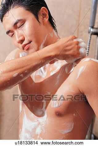 Picture - soap, refreshing, bathroom, beautification, young man, beauty, beauty spa male. Fotosearch