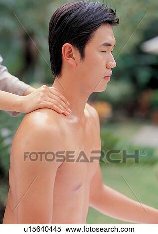 Stock Photography - two people, leisure, close-up, treatment, body spa, standing, black hair. Fotosearch